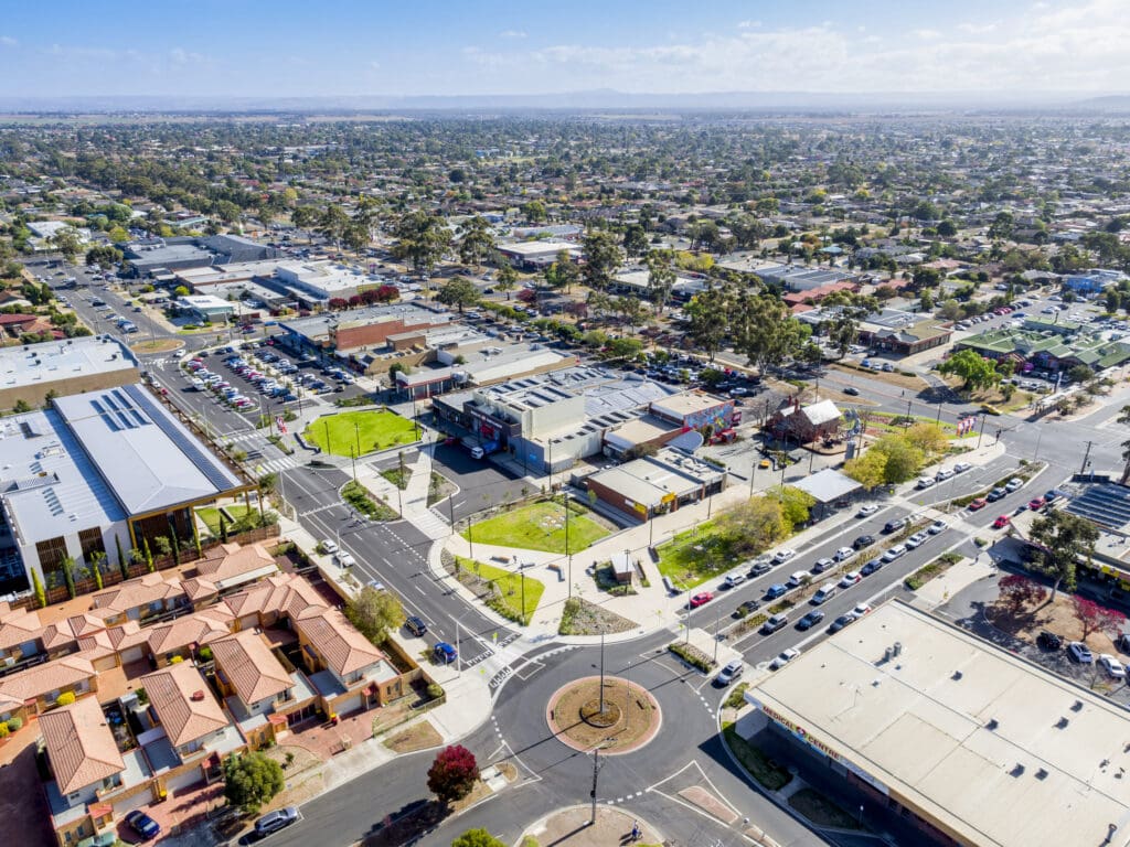 Aerial view of Melton Town Centre with streets, shops, car parks and landscaped public spaces